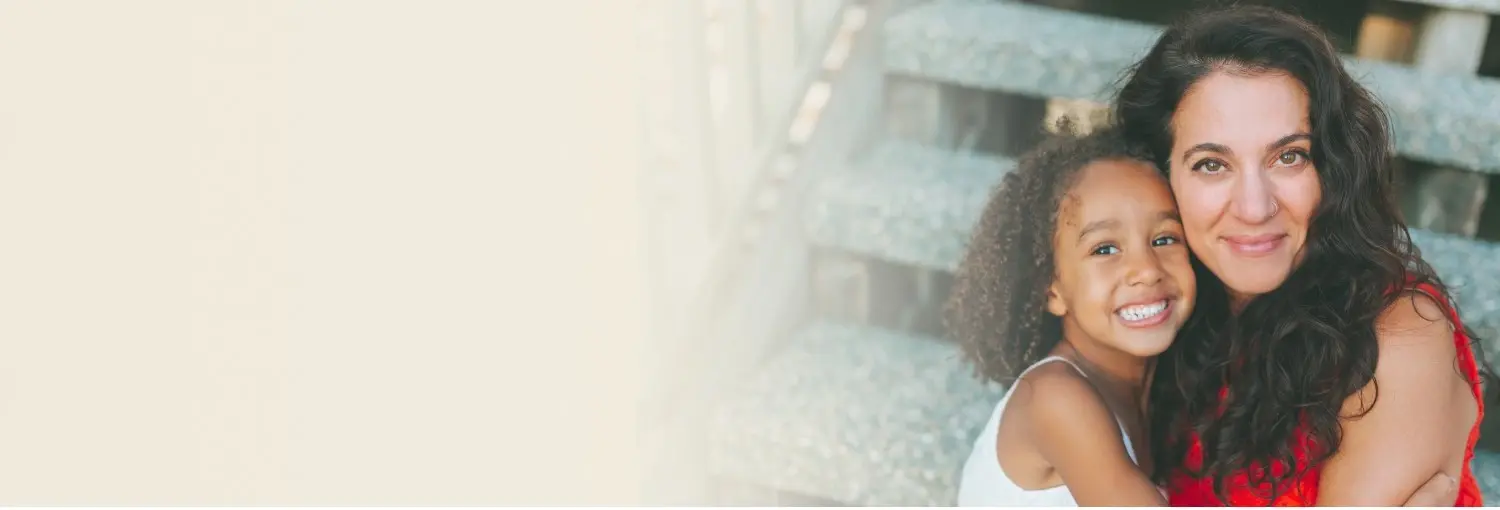 Happy mother and child sitting together, symbolizing connection in Know Your Child workshop