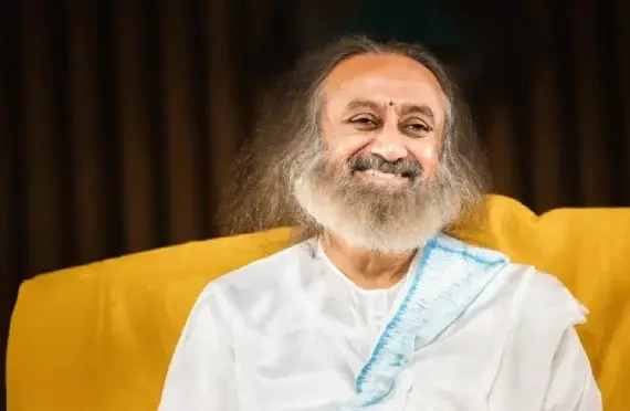 Sri Sri Ravi Shankar smiling peacefully, spiritual guide of Art of Living's sleep and anxiety relief program