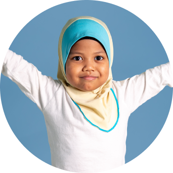 Child in blue hijab with out stretched arms and smiling softly